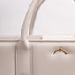 Qosmic Metis Moonstone - cream briefcase - logo detail