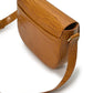 Camel coconut engraved leather flap crossbody bag Crossbody Bags Leandra 